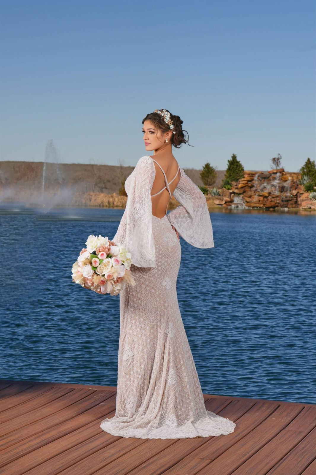 Ivory boho lace bridal gown with flared sleeves