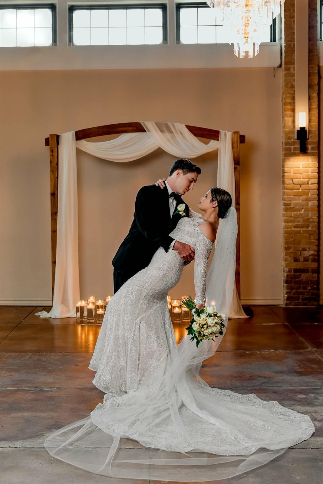 Beaded lace mermaid wedding gown with cathedral veil