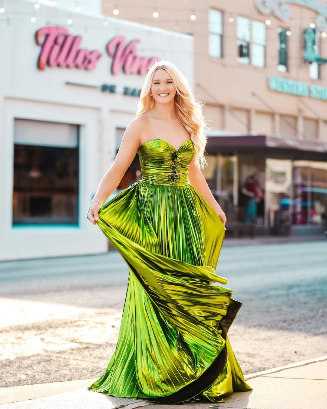 Metallic green prom gown on Main Street